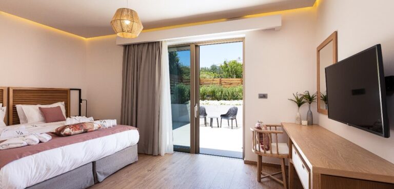 Bedroom opening onto a private terrace at a villa in Agia Marina, near Chania